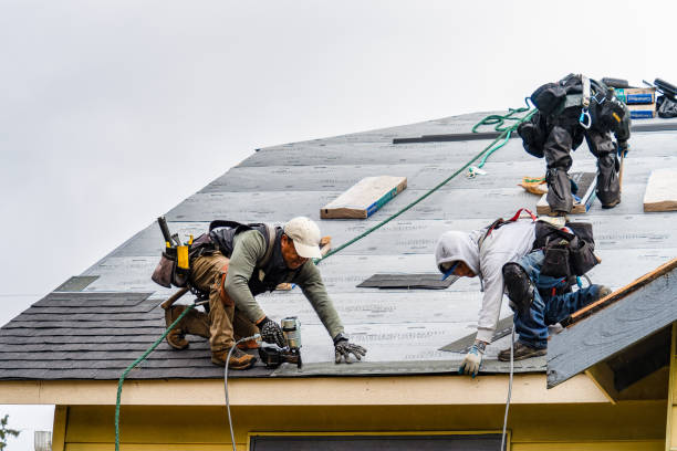 Professional Gutter Installation technician working in Midland, OR